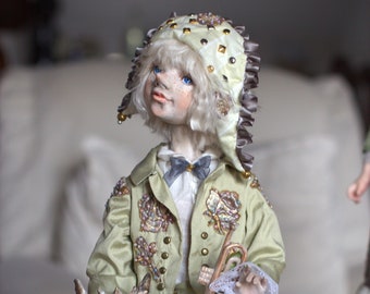 Interior doll Harlequin in a dragon mask, symbol of 2024