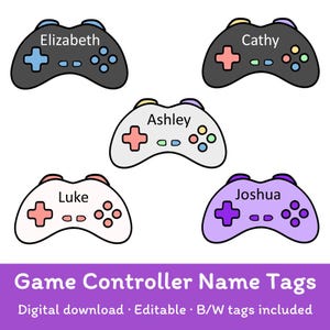 May include: Five colorful game controller name tags with names Elizabeth, Cathy, Ashley, Luke, and Joshua. The controllers are black, gray, and purple with various button colors. Text at the bottom reads "Game Controller Name Tags".