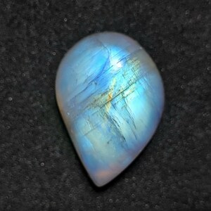 Pendente in pietra di luna bianca arcobaleno naturale Ultimate Fire, taglio cabochon, 22,45 carati, dimensioni 22x14x10 mm.