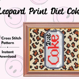 May include: A framed cross-stitch pattern featuring a Diet Coke can with a red and white logo, set against a leopard print background. The text "Leopard Print Diet Coke" and "PDF Cross Stitch Pattern" are visible.