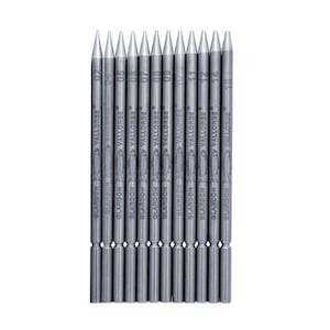 May include: A set of 12 silver-colored metal pen nibs with different sizes marked on them. The nibs are labeled with the brand name "VALLORBE" and "GLARDON".