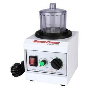 May include: White jewelry polishing machine with a clear plastic container on top. The machine has a power switch, speed control knob, and time control knob. The machine is labeled "Super Finish Jewelry Tools".