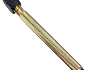 May include: A gold-colored metal hand drill with a black plastic handle. The drill has a knurled grip for a secure hold.