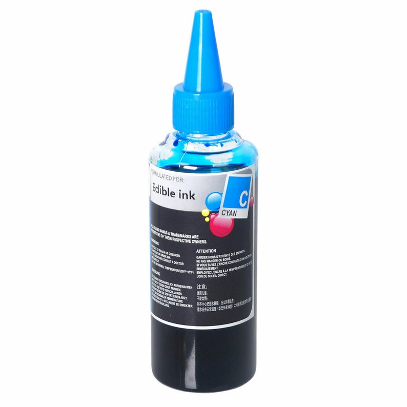 May include: A blue bottle of edible cyan ink with a label that says "Edible ink" and "Cyan".