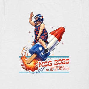 May include: White t-shirt featuring a colorful illustration of a person riding a rocket. The rocket is designed with red, white, and blue elements. The text "MSG 2025" and "DECEMBER 28-29-30-31, 2025" are printed below the rocket.