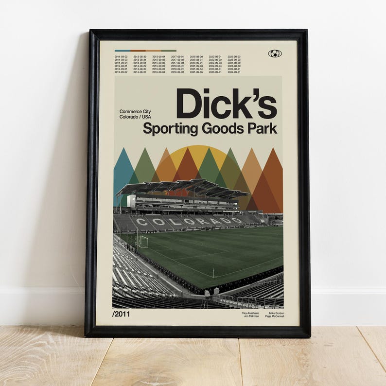 May include: A vintage-style poster featuring a black and white photo of Dick's Sporting Goods Park in Commerce City, Colorado. The poster has a geometric design with colorful triangles and a sunset behind the stadium. The text "Dick's Sporting Goods Park" is in bold black letters.