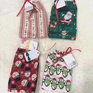 Cadeaukaarthouder! Kaarten zijn duur, dus koop een schattige, herbruikbare draagtas om je cadeaubon mee op te fleuren!