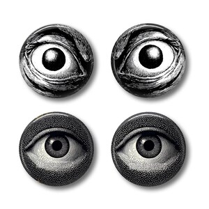 May include: Four round, black and white eye-themed buttons. Two buttons feature an eye with detailed shading, while the other two have a different eye design with a textured background. All have a glossy finish.