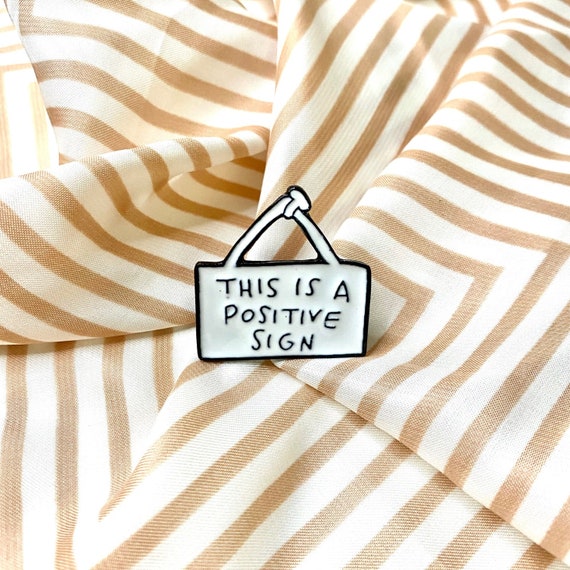 This is a Positive Sign  Enamel Pin