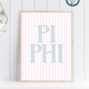 May include: A framed print featuring the Greek letters PI and PHI in a light blue and pink pattern. The background has vertical pink and white stripes. The frame is a light wood color. The print is an Affinity Licensed Product.