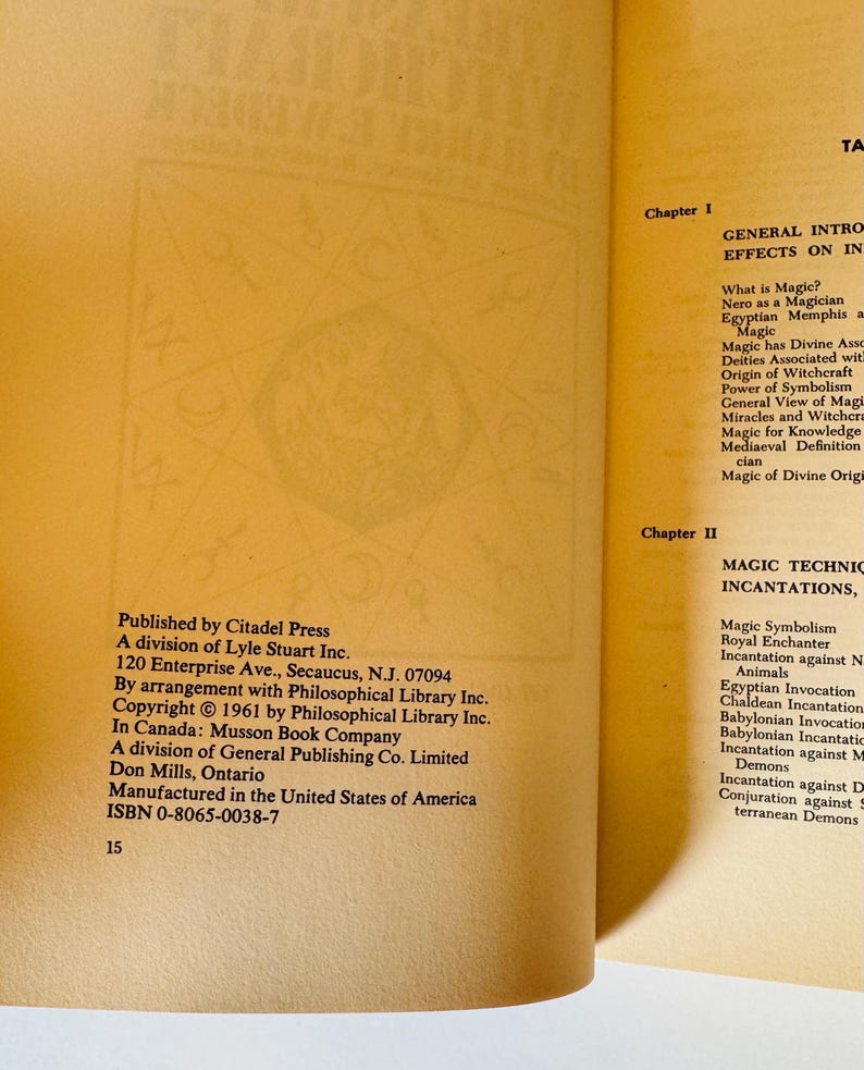 May include: Open book with text about magic, including chapter titles and subheadings. The book is published by Citadel Press and includes the ISBN. The pages are yellowed with age.