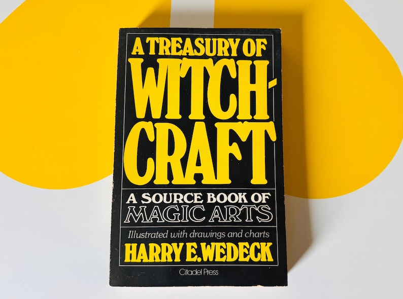 May include: A black book titled "A Treasury of Witchcraft" with yellow lettering. The book is a source book of magic arts, illustrated with drawings and charts. The author's name is Harry E. Wedeck.