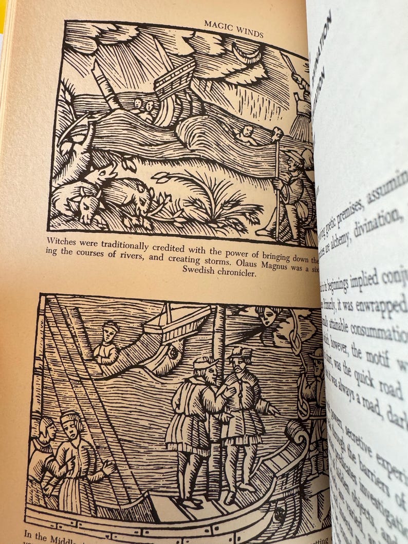 May include: Two black and white illustrations from a book. The top image shows a ship in a storm with figures and animals. The text "MAGIC WINDS" is at the top. The bottom image depicts figures on a boat. Text is visible at the bottom.