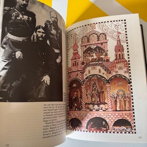 May include: Open book with two facing pages. One page features a black and white photograph of several men in military uniforms. The other page displays a colorful illustration of a building with multiple towers and arches, with figures inside.