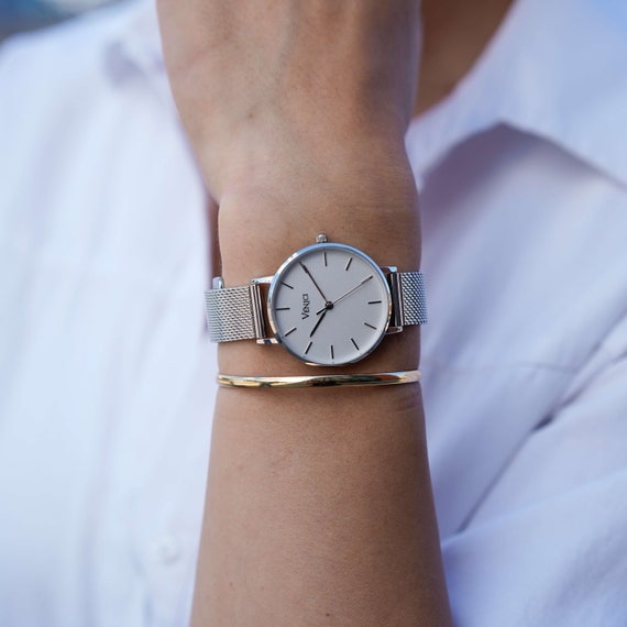 silver dress watches for women Timex Women's Solar Premium Dress 28mm Watch Silver-Tone Case & Dial with Stainless Steel Bracelet