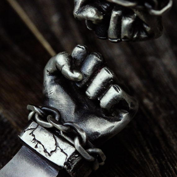 Sterling silver shop bangles with fists