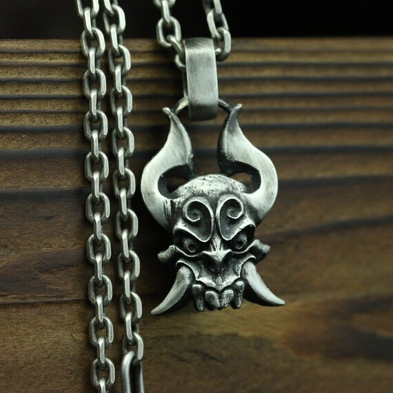 Demon horn necklace in weapon slot? : r/runescape