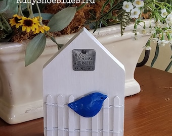 Drewniany klocek „Shadowbird on Fence”: cytat Thoreau lub Tolkiena