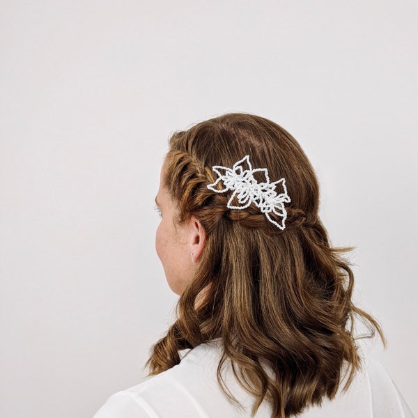 Peigne de cheveux de mariée de fleur d’orchidée, couleur blanche de crème d’ivoire