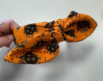 Diadema con nudo de gato