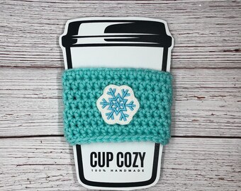 Funda de taza de crochet con forma de copo de nieve