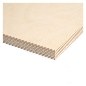 May include: A close-up of a sheet of light brown plywood with a smooth surface and visible layers of wood veneer.
