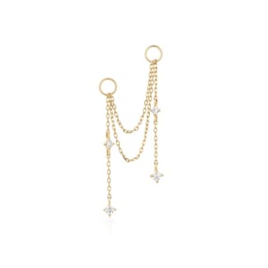 May include: Gold-toned earrings with a cascading chain design. Each earring features a small hoop at the top, connected to multiple delicate chains. The chains are adorned with sparkling, clear gemstones, creating a layered and elegant look.