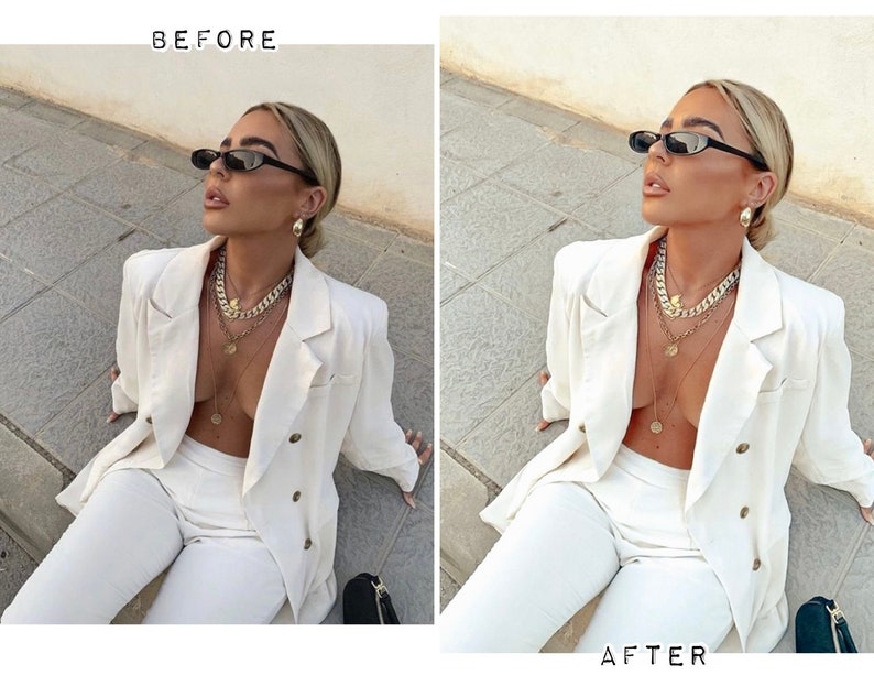 May include: A woman wearing a white blazer, white pants, and gold necklaces. She is wearing black sunglasses and has her hair pulled back.