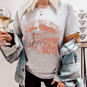 Raisin' Hell with the Hippies and Cowboys t-shirt, Country concert tee, Nashville tee Western Clothes Cowgirl tshirt, western graphic tshirt