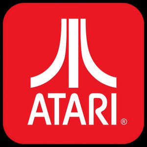 May include: A red square with a white Atari logo. The logo features a stylised "A" with two curved lines extending from the top and bottom. The word "ATARI" is written in white below the logo, with a registered trademark symbol to the right.