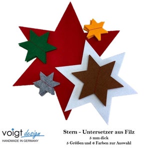 Könnte beinhalten: Sortiment an Filz-Stern-Untersetzern in Rot, Grün, Grau, Orange, Braun und Weiß. Die Untersetzer sind 5 mm dick und in 5 Größen erhältlich. Der Text auf dem Bild lautet "Stern - Untersetzer aus Filz 5 mm dick 5 Größen und 6 Farben zur Auswahl".