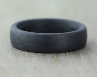 4 to 7mm Wide, Carbon Fiber, Wedding / Engagement Ring with FREE engraving. Hand wound Black Carbon Fibre wedding band.