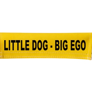 May include: Yellow fabric dog collar with black text that reads "LITTLE DOG - BIG EGO".