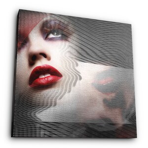 May include: A close-up of a woman's face with red lipstick and dramatic eye makeup. The image is layered with a black and white patterned design, creating a modern and abstract look.