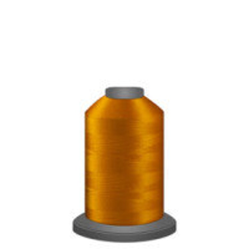 May include: A spool of bright orange thread.