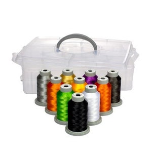 May include: A clear plastic storage case with a handle, containing 12 spools of colorful embroidery thread. The spools are arranged in two rows of six, with the colors including green, orange, white, black, purple, and gray.