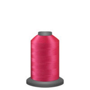 May include: A spool of bright pink thread for sewing or embroidery.