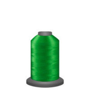 May include: A spool of bright green thread.