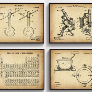 May include: Set of four framed vintage science prints. Includes a chemical apparatus diagram, a microscope diagram, a periodic table of elements, and a mortar and pestle diagram. Each print is in black and white on a tan background.