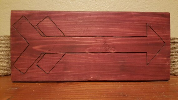 Stained Wood With Burnt Arrow