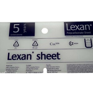May include: A white Lexan polycarbonate sheet with a 5-year limited warranty. The sheet is labeled with safety and masking symbols, a CSK 506 code, and a CE mark with the number A0224. The sheet is also labeled with the text "Lexan sheet".