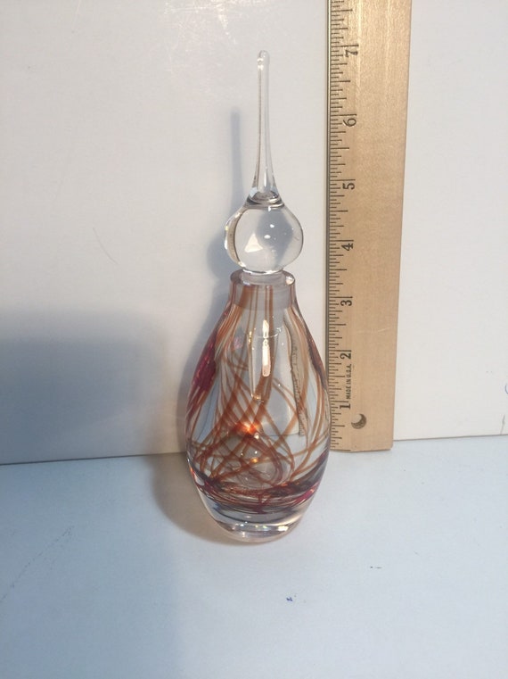 Orange swirl perfume bottle.