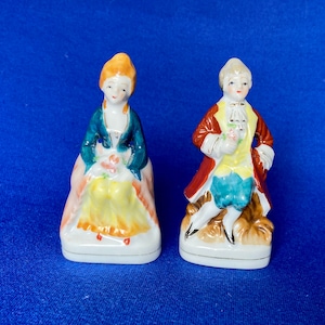 Pair of Victorian Porcelain Figurines, made in Japan. 3 1/2”tall