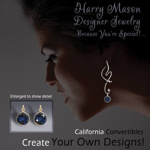 May include: A close-up of a woman's ear with a silver earring featuring a blue gemstone. The earring is a long, curved design. The image also shows a close-up of two small earrings with blue gemstones. The text "Harry Mason Designer Jewelry...Because You're Special!" is at the top of the image. The text "California Convertibles Create Your Own Designs!" is at the bottom of the image.