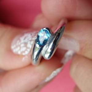 Silver women Swiss blue topaz overlap ring Oval gemstone