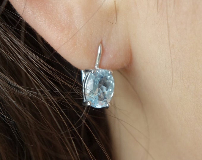 Silver earrings with oval topaz Sky blue Lever back