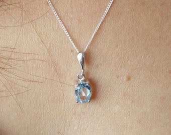 Silver oval topaz Swiss blue pendant