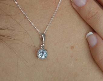 Silver pendant with round topaz Sky blue Tiny necklace