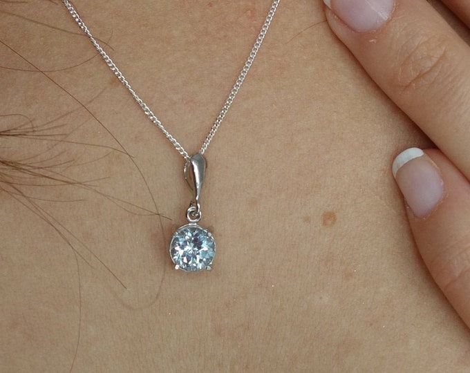 Silver pendant with round topaz Sky blue Tiny necklace