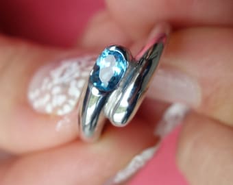 Silver women Swiss blue topaz overlap ring Oval gemstone